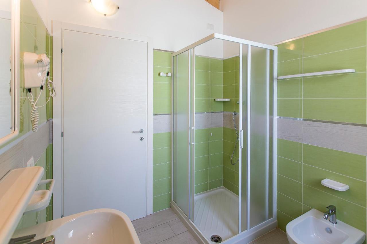 Altanea Apartments Con Piscina Каорле Екстериор снимка
